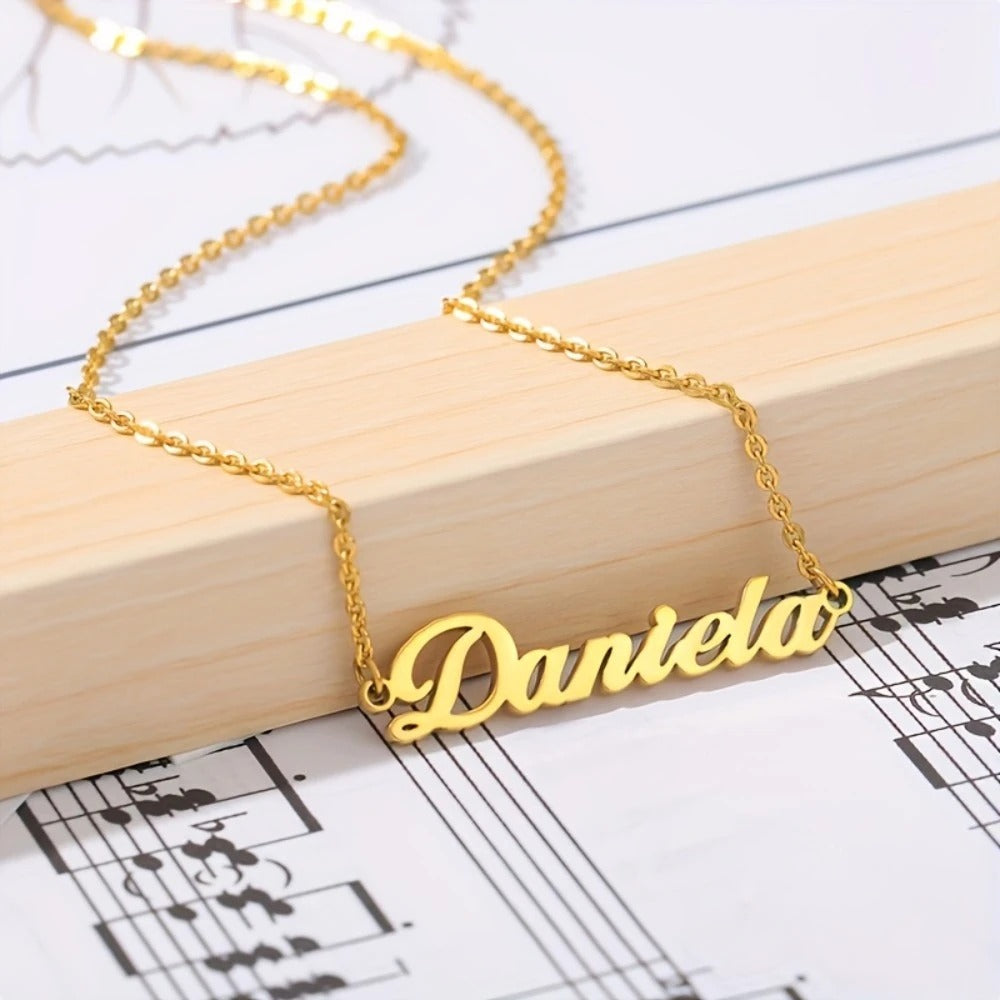 Silver custom name necklace close-up cursive lettering