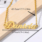 Woman wearing personalized gold nameplate necklace