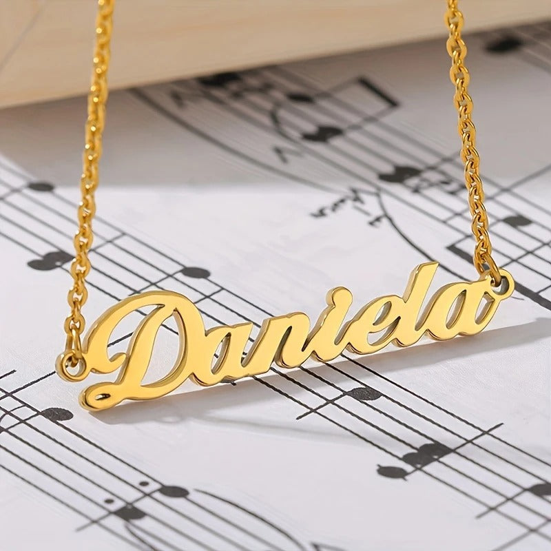 Gold cursive name necklace pendant detail