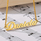 Gold cursive name necklace pendant detail